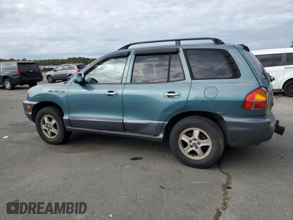 2003 Hyundai Santa Fe GLS with VIN KM8SC73D03U421863, listed as a Copart auction lot 71573724 with 184,028 mi miles and Salvage Title. Bid and sale history available at carsss.com. Image 2.