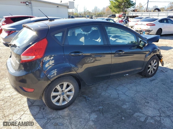 2013 Ford Fiesta SE with VIN 3FADP4EJXDM202150, listed as a Copart auction lot 79851174 with 127,979 mi miles and Salvage Title. Bid and sale history available at carsss.com. Image 3.