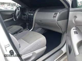 2010 Toyota Corolla with VIN JTDBU4EE6AJ063009, listed as a IAAI auction lot 42034688 with 168,643 mi miles. Bid and sale history available at carsss.com. Image 5.