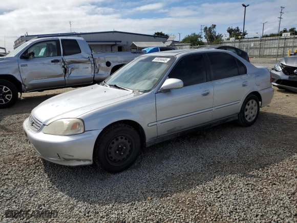 1999 Honda Civic EX with VIN 1HGEJ8649XL023265, listed as a Copart auction lot 53534445 with 265,017 mi miles and Clean Title. Bid and sale history available at carsss.com. Image 1.