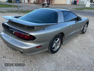 1999 Pontiac Firebird Formula with VIN 2G2FV22G1X2205745, listed as a Copart auction lot 65841425 with 142,913 mi miles and Clean title. Bid and sale history available at DreamBid. Image 4.