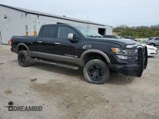 2016 Nissan Titan SL with VIN 1N6BA1F43GN501304, listed as a Copart auction lot 54144175 with 149,430 mi miles and Clean title. Bid and sale history available at DreamBid. Image 4.