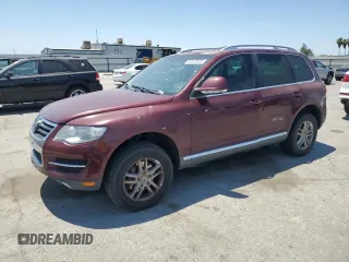 2009 Volkswagen Touareg V6 z VIN WVGLE77L39D032451, wystawiony jako Copart lot #60375605 z przebiegiem 205 767 mil mil oraz Czysty tytuł • Clean title. Historia ofert i sprzedaży dostępna na DreamBid. Obrazek 1.