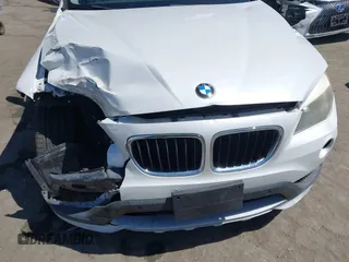 2015 BMW X1 sDrive28i z VIN WBAVM1C5XFV315999, wystawiony jako IAAI lot #42326240 z przebiegiem 120 961 mil mil oraz . Historia ofert i sprzedaży dostępna na DreamBid. Obrazek 12.