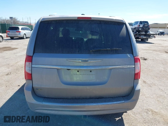 2016 Chrysler Town & Country Touring with VIN 2C4RC1BG7GR157863, listed as a IAAI auction lot 41849422 with 218,936 mi miles and . Bid and sale history available at DreamBid. Image 16.