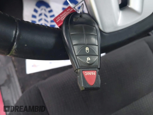 2014 Dodge Grand Caravan American Value with VIN 2C4RDGBG0ER452719, listed as a IAAI auction lot 41547145 with 151,636 mi miles and . Bid and sale history available at DreamBid. Image 11.