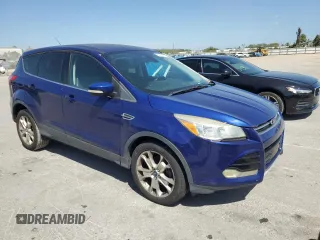 2013 Ford Escape SEL with VIN 1FMCU0HX8DUA28397, listed as a Copart auction lot 52000115 with 147,204 mi miles and Clean Title. Bid and sale history available at carsss.com. Image 4.