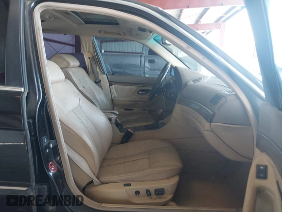 1999 BMW 7 Series 740il with VIN WBAGH8336XDP03839, listed as a IAAI auction lot 42067133 with 163,345 mi miles. Bid and sale history available at carsss.com. Image 5.