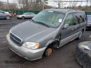 2005 Kia Sedona LX with VIN KNDUP132756687577, listed as a IAAI auction lot 41970855 with Not Provided miles and . Bid and sale history available at DreamBid. Image 2.