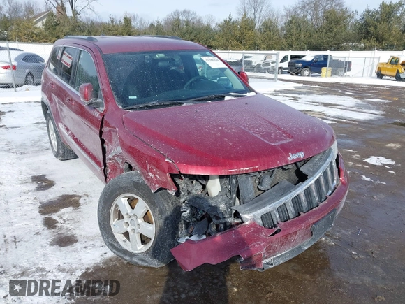 2013 Jeep Grand Cherokee Laredo with VIN 1C4RJFAG4DC572986, listed as a IAAI auction lot 41586820 with 100,899 mi miles. Bid and sale history available at carsss.com. Image 1.