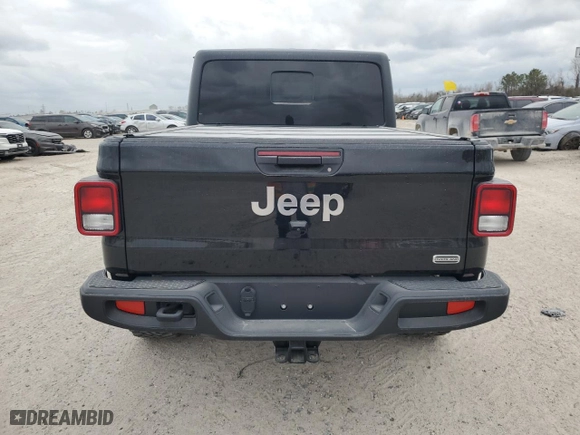 2023 Jeep Gladiator Overland with VIN 1C6HJTFG2PL559314, listed as a Copart auction lot 44985505 with 9,434 mi miles and Salvage Title. Bid and sale history available at carsss.com. Image 6.