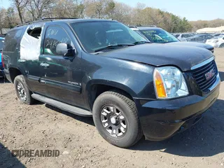 2007 GMC Yukon SLT z VIN 1GKFK13027J122986, wystawiony jako IAAI lot #41352997 z przebiegiem Nie podano mil oraz . Historia ofert i sprzedaży dostępna na DreamBid. Obrazek 1.