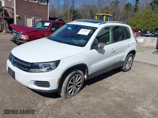 2017 Volkswagen Tiguan Wolfsburg Edition with VIN WVGSV7AX8HK001374, listed as a IAAI auction lot 42070567 with 75,834 mi miles. Bid and sale history available at carsss.com. Image 16.