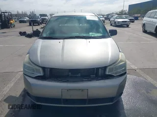 2008 Ford Focus SE with VIN 1FAHP33NX8W135881, listed as a IAAI auction lot 41668949 with 160,261 mi miles. Bid and sale history available at carsss.com. Image 13.