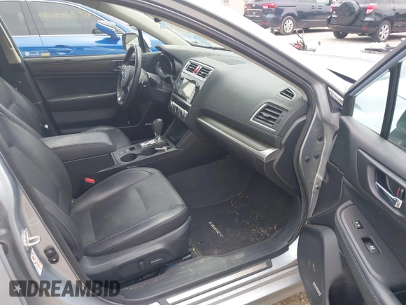 2015 Subaru Legacy Limited with VIN 4S3BNBN65F3075108, listed as a IAAI auction lot 42802400 with 140,886 mi miles and . Bid and sale history available at DreamBid. Image 5.
