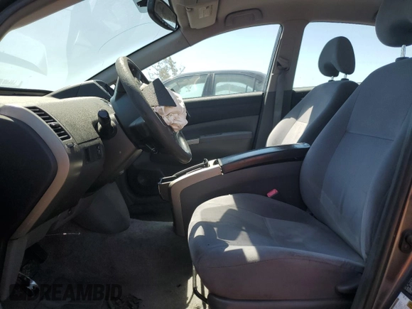 2007 Toyota Prius with VIN JTDKB20U173202615, listed as a Copart auction lot 61873945 with 219,911 mi miles and Salvage title. Bid and sale history available at DreamBid. Image 7.