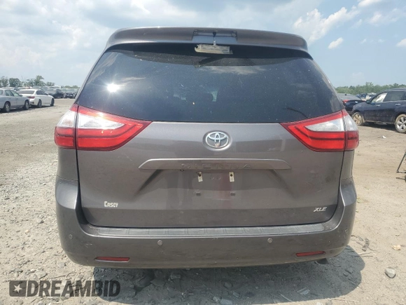 2015 Toyota Sienna XLE with VIN 5TDYK3DC6FS576670, listed as a Copart auction lot 62612345 with 106,475 mi miles and Salvage title. Bid and sale history available at DreamBid. Image 6.