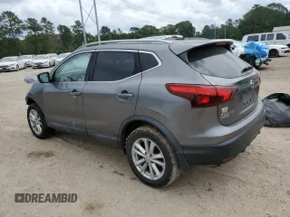 2017 Nissan Rogue SV with VIN JN1BJ1CP4HW013785, listed as a Copart auction lot 57387635 with 139,103 mi miles and Salvage title. Bid and sale history available at DreamBid. Image 2.
