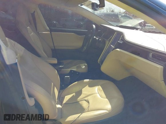 2014 Tesla Model S 60 with VIN 5YJSA1H1XEFP34226, listed as a IAAI auction lot 41806604 with 216,021 mi miles and . Bid and sale history available at DreamBid. Image 5.