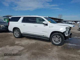 2021 GMC Yukon XL SLT with VIN 1GKS1GKD6MR100561, listed as a IAAI auction lot 41609215 with 37,429 mi miles and . Bid and sale history available at carsss.com. Image 13.