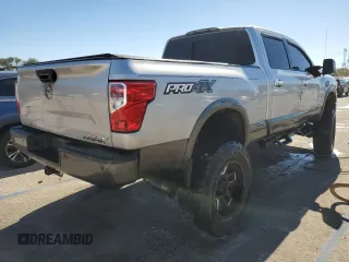 2017 Nissan Titan XD SV with VIN 1N6BA1F4XHN521471, listed as a Copart auction lot 76291024 with 100,447 mi miles and Salvage Title. Bid and sale history available at carsss.com. Image 3.
