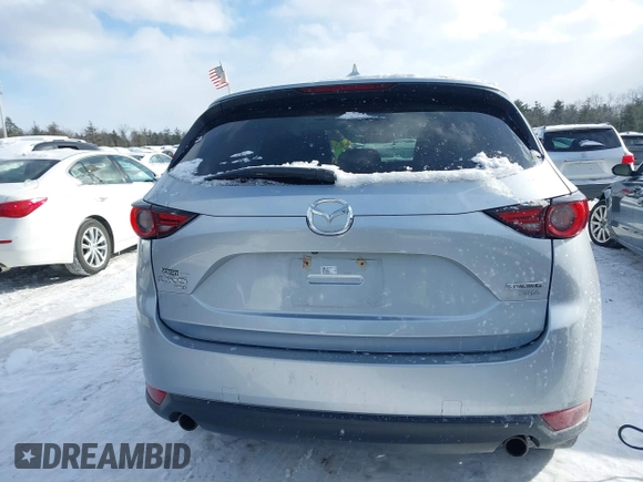 2021 Mazda CX-5 Grand Touring Reserve with VIN JM3KFBAY0M0377030, listed as a IAAI auction lot 41606709 with 39,590 mi miles. Bid and sale history available at carsss.com. Image 16.