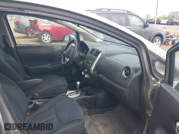 2014 Nissan Note SV with VIN 3N1CE2CP6EL401908, listed as a IAAI auction lot 42142322 with 139,736 mi miles and . Bid and sale history available at DreamBid. Image 5.