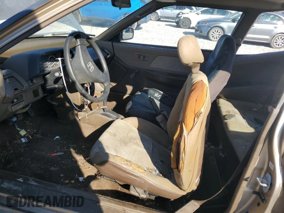 1989 Honda Civic z VIN JHMED6451KS002428, wystawiony jako Copart lot #86497404 z przebiegiem 241 207 mil mil oraz Szkoda całkowita • Salvage title. Historia ofert i sprzedaży dostępna na DreamBid. Obrazek 7.