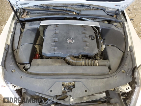 2014 Cadillac CTS Premium with VIN 1G6DD1E38E0178165, listed as a Copart auction lot 77033664 with 49,406 mi miles and Salvage title. Bid and sale history available at DreamBid. Image 11.