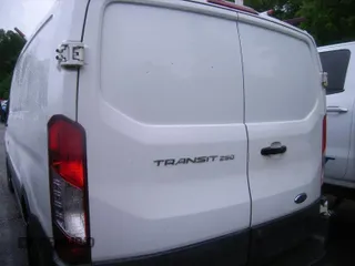2016 Ford Transit Cargo with VIN 1FTYR1ZM4GKA09500, listed as a IAAI auction lot 42304806 with 186,333 mi miles and . Bid and sale history available at DreamBid. Image 8.