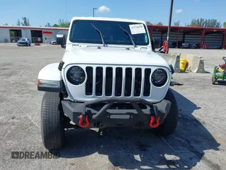 2020 Jeep Wrangler Unlimited Sahara с VIN 1C4HJXEN1LW104950, выставлен на аукционе IAAI как лот 42278650 с пробегом 40 638 миль миль и . История ставок и продаж доступна на DreamBid. Изображение 13.