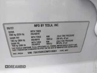 2022 Tesla Model Y Long Range with VIN 7SAYGDEE3NF518061, listed as a IAAI auction lot 41896233 with 34,714 mi miles and . Bid and sale history available at carsss.com. Image 9.