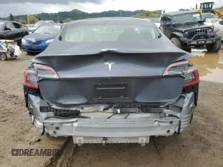 2023 Tesla Model 3 with VIN 5YJ3E1EA8PF677153, listed as a Copart auction lot 51065165 with 27,088 mi miles and Salvage Title. Bid and sale history available at carsss.com. Image 6.