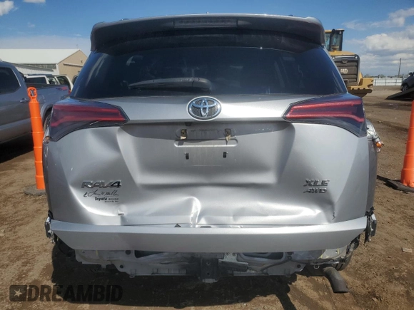 2018 Toyota RAV4 XLE with VIN 2T3RFREV2JW699448, listed as a Copart auction lot 55345975 with 46,437 mi miles and Salvage Title. Bid and sale history available at DreamBid. Image 6.