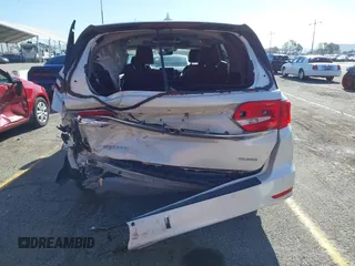 2018 Honda Odyssey Touring with VIN 5FNRL6H8XJB019122, listed as a IAAI auction lot 41820212 with 144,014 mi miles. Bid and sale history available at carsss.com. Image 6.