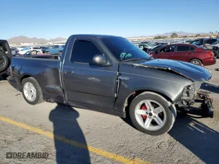 2003 Ford F-150 Lightning with VIN 2FTRF07313CA43362, listed as a Copart auction lot 87544765 with 98,589 mi miles and Salvage Title. Bid and sale history available at carsss.com. Image 4.