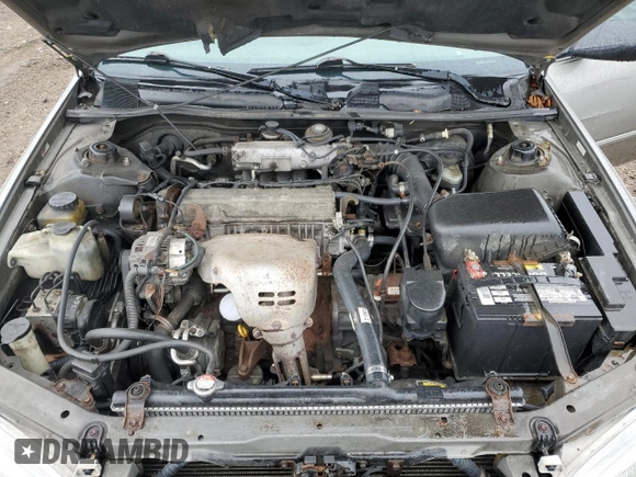 1997 Toyota Camry LE z VIN 4T1BG22K6VU106916, wystawiony jako Copart lot #56707935 z przebiegiem 235 517 mil mil oraz Szkoda całkowita • Salvage title. Historia ofert i sprzedaży dostępna na DreamBid. Obrazek 11.