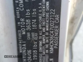 2007 Hyundai Accent SE z VIN KMHCN36C47U027122, wystawiony jako Copart lot #52224605 z przebiegiem 169 022 mil mil oraz Szkoda całkowita • Salvage title. Historia ofert i sprzedaży dostępna na DreamBid. Obrazek 12.