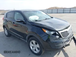2012 Kia Sportage LX z VIN KNDPB3A2XC7198303, wystawiony jako IAAI lot #42056551 z przebiegiem 200 000 mil mil oraz . Historia ofert i sprzedaży dostępna na DreamBid. Obrazek 1.