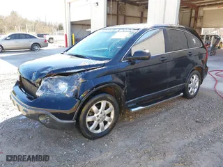 2007 Honda CR-V EX with VIN JHLRE38557C016250, listed as a IAAI auction lot 41700926 with 211,584 mi miles. Bid and sale history available at carsss.com. Image 2.