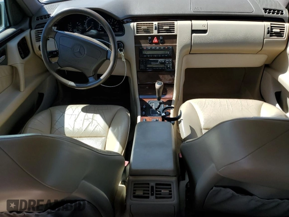 1997 Mercedes-Benz E-Class with VIN WDBJF55F4VJ032270, listed as a Copart auction lot 48010725 with 191,091 mi miles and Salvage Title. Bid and sale history available at carsss.com. Image 8.