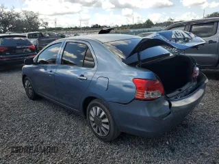 2009 Toyota Yaris z VIN JTDBT903X91297199, wystawiony jako Copart lot #57088615 z przebiegiem 161 170 mil mil oraz Szkody całkowita. Historia ofert i sprzedaży dostępna na DreamBid. Obrazek 2.