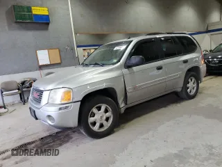 2005 GMC Envoy SLT with VIN 1GKDT13S652197929, listed as a Copart auction lot 42104855 with 228,515 mi miles and Salvage Title. Bid and sale history available at carsss.com. Image 1.