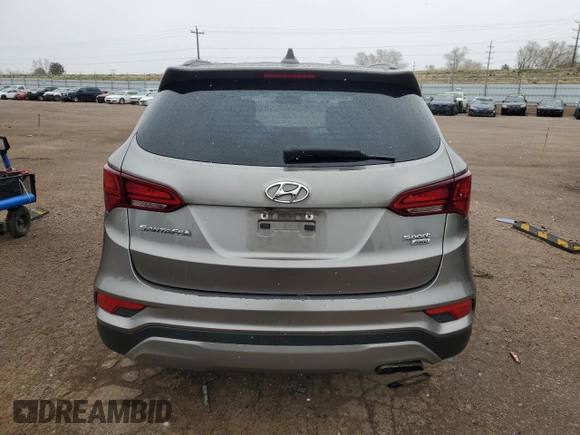 2017 Hyundai Santa Fe 2.4L z VIN 5NMZUDLB7HH030253, wystawiony jako Copart lot #51302445 z przebiegiem 136 074 mil mil oraz Szkoda całkowita • Salvage title. Historia ofert i sprzedaży dostępna na DreamBid. Obrazek 6.