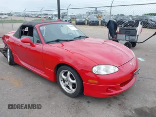 2002 Mazda MX-5 Miata Cloth with VIN JM1NB353220229173, listed as a IAAI auction lot 42344106 with 153,242 mi miles and . Bid and sale history available at DreamBid. Image 1.