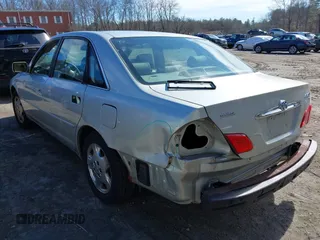 2004 Toyota Avalon XL z VIN 4T1BF28B64U340420, wystawiony jako IAAI lot #41753265 z przebiegiem 173 302 mil mil oraz . Historia ofert i sprzedaży dostępna na DreamBid. Obrazek 3.