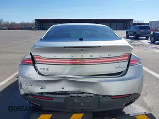 2014 Lincoln MKZ with VIN 3LN6L2G99ER832666, listed as a IAAI auction lot 41732639 with 168,962 mi miles. Bid and sale history available at carsss.com. Image 6.