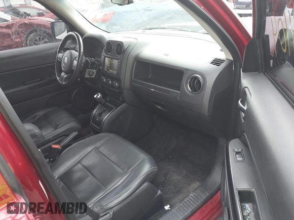 2014 Jeep Patriot Latitude with VIN 1C4NJPFA6ED856768, listed as a IAAI auction lot 41644104 with 133,287 mi miles and . Bid and sale history available at carsss.com. Image 5.