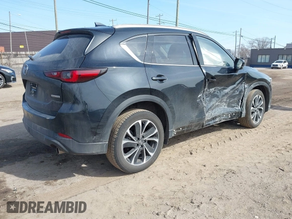 2023 Mazda CX-5 S Premium with VIN JM3KFBDM7P0201038, listed as a IAAI auction lot 41772989 with 26,227 mi miles and . Bid and sale history available at DreamBid. Image 4.