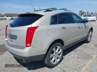 2011 Cadillac SRX Premium Collection z VIN 3GYFNCEY3BS506360, wystawiony jako IAAI lot #42096225 z przebiegiem 173 514 mil mil oraz . Historia ofert i sprzedaży dostępna na DreamBid. Obrazek 4.